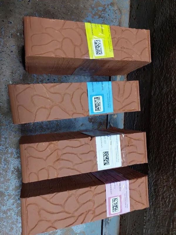 Bricks with labels of different batches