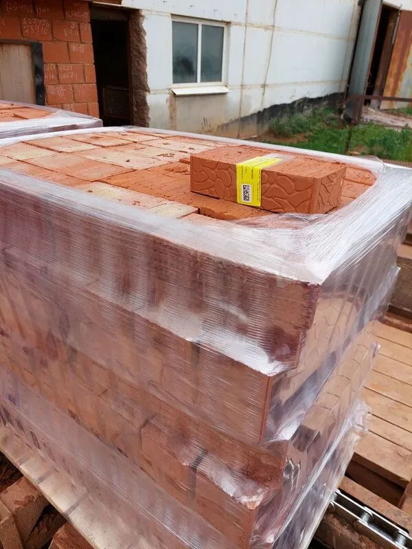 Pallet of bricks with a batch label